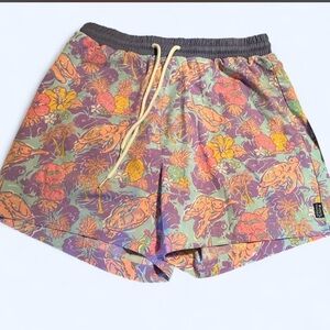 Simply Southern Purple Tropicaland turtle Print Swim Trunks